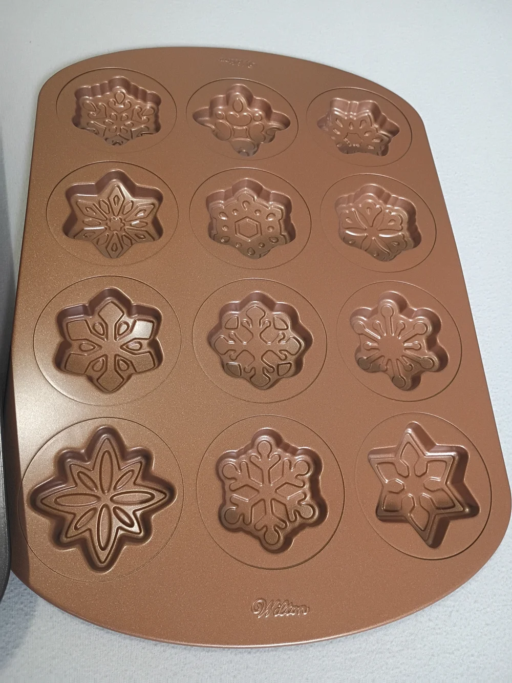 Wilton Non-Stick Holiday Baking Bundle 6-Cavity Halloween & 12-Cavity Snowflakes